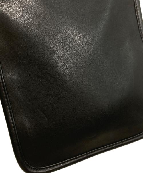 TUMI（トゥミ）TUMI (トゥミ) レザーショルダーバッグ ブラックの古着・服飾アイテム