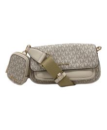MICHAEL KORS（マイケルコース）の古着「JET SET TRAVEL フラップ クロスボディ ウィズ テックアタッチ」｜アイボリー