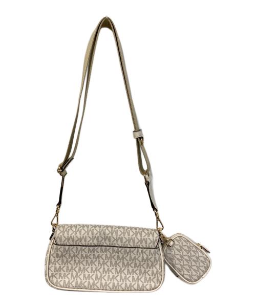 MICHAEL KORS（マイケルコース）MICHAEL KORS (マイケルコース) JET SET TRAVEL フラップ クロスボディ ウィズ テックアタッチ アイボリーの古着・服飾アイテム