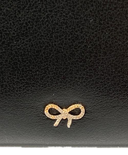 ANYA HINDMARCH（アニヤ・ハインドマーチ）ANYA HINDMARCH (アニヤハインドマーチ) ラウンドファスナー長財布 ブラックの古着・服飾アイテム