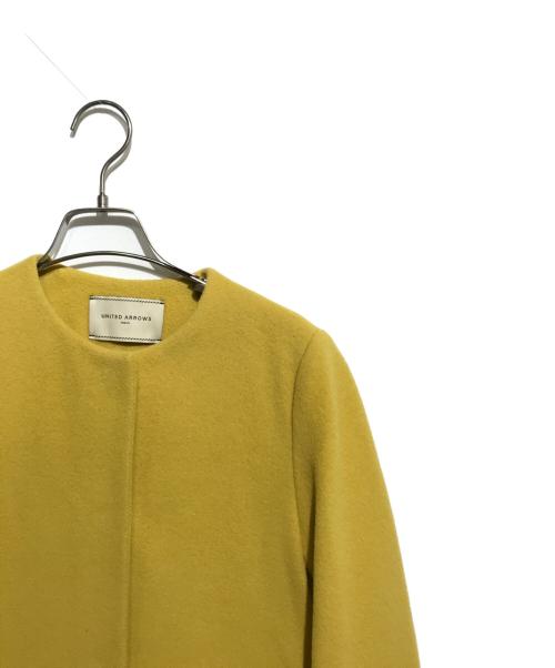 UNITED ARROWS TOKYO（ユナイテッドアローズトウキョウ）UNITED ARROWS TOKYO (ユナイテッドアローズトウキョウ) ノーカラーコート イエロー サイズ:34の古着・服飾アイテム