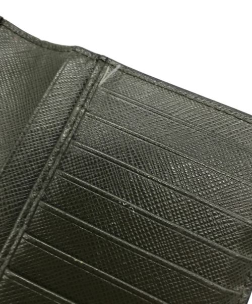 PRADA（プラダ）PRADA (プラダ) バイカラーロングウォレット ブラックの古着・服飾アイテム