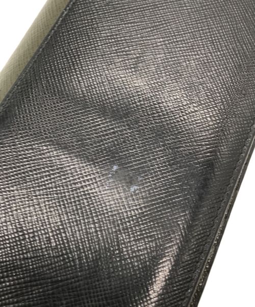 PRADA（プラダ）PRADA (プラダ) バイカラーロングウォレット ブラックの古着・服飾アイテム