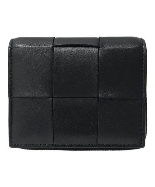 BOTTEGA VENETA（ボッテガベネタ）BOTTEGA VENETA (ボッテガベネタ) スモール カセット 二つ折りファスナーウォレット ブラックの古着・服飾アイテム