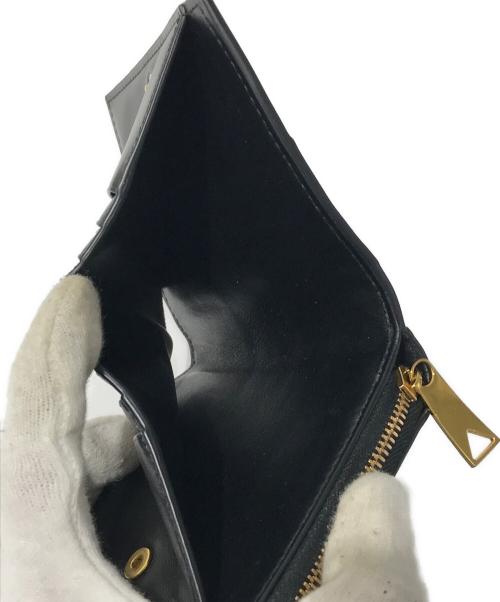 BOTTEGA VENETA（ボッテガベネタ）BOTTEGA VENETA (ボッテガベネタ) スモール カセット 二つ折りファスナーウォレット ブラックの古着・服飾アイテム