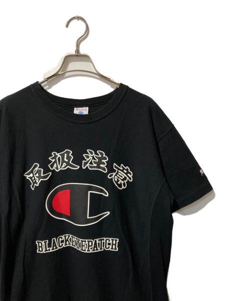 Champion（チャンピオン）Champion (チャンピオン) BlackEyePatch (ブラックアイパッチ) プリントTシャツ ブラック サイズ:Lの古着・服飾アイテム