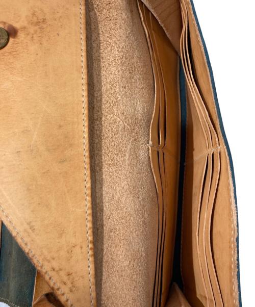 IL BISONTE（イル ビゾンテ）IL BISONTE (イル ビゾンテ) ダブルフラップ型押しロングウォレット ブラック×ブラウンの古着・服飾アイテム