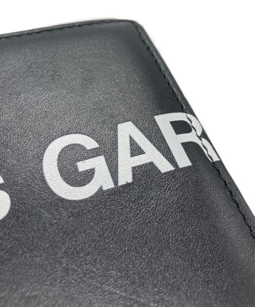 COMME des GARCONS（コムデギャルソン）COMME des GARCONS (コムデギャルソン) HUGE LOGO  2つ折り財布 ブラックの古着・服飾アイテム