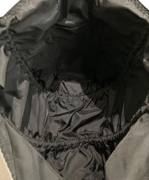 NOMADIS（ノマディス）NOMADIS (ノマディス) リバーシブルトートバッグ グレー×ブラックの古着・服飾アイテム