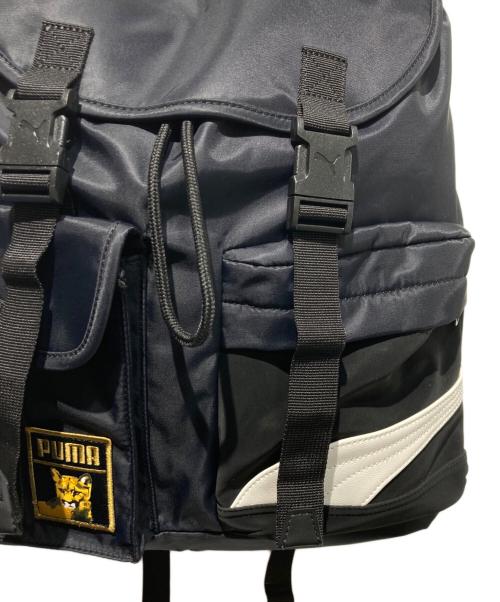 PUMA（プーマ）PUMA (プーマ) ear PAPILLONNER (イアパピヨネ) コラボフラップリュック ブラックの古着・服飾アイテム