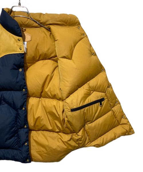 RockyMountainFeatherBed（ロッキーマウンテンフェザーベッド）RockyMountainFeatherBed (ロッキーマウンテンフェザーベッド) 50th ANNIVERSARY Down Vest ネイビー サイズ:42の古着・服飾アイテム
