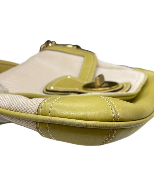 COACH（コーチ）COACH (コーチ) 65th ターンロック ショルダーバッグ アイボリー×グリーンの古着・服飾アイテム