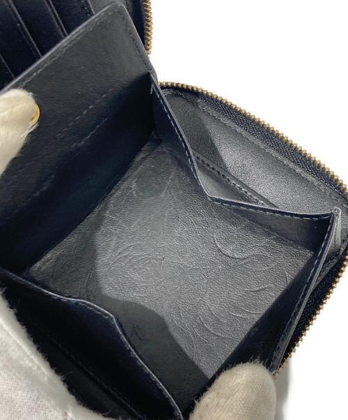 COMME des GARCONS（コムデギャルソン）COMME des GARCONS (コムデギャルソン) ラウンドファスナー財布 ブラックの古着・服飾アイテム