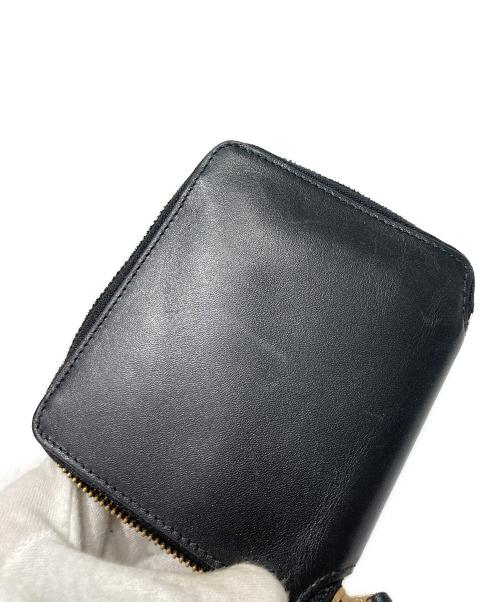 COMME des GARCONS（コムデギャルソン）COMME des GARCONS (コムデギャルソン) ラウンドファスナー財布 ブラックの古着・服飾アイテム