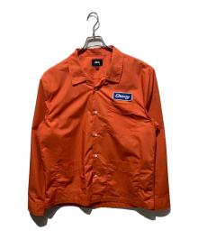 stussy（ステューシー）の古着「ロングスリーブシャツ」｜オレンジ