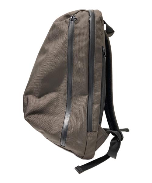 UNIVERSAL PRODUCTS.（ユニバーサルプロダクツ）UNIVERSAL PRODUCTS. (ユニバーサルプロダクツ) NEW UTILITY BAG リュック ブラウンの古着・服飾アイテム