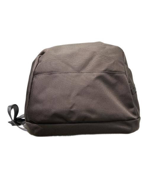UNIVERSAL PRODUCTS.（ユニバーサルプロダクツ）UNIVERSAL PRODUCTS. (ユニバーサルプロダクツ) NEW UTILITY BAG リュック ブラウンの古着・服飾アイテム