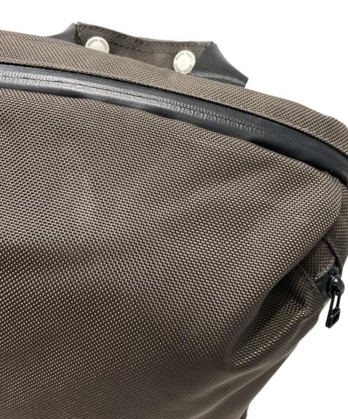 UNIVERSAL PRODUCTS.（ユニバーサルプロダクツ）UNIVERSAL PRODUCTS. (ユニバーサルプロダクツ) NEW UTILITY BAG リュック ブラウンの古着・服飾アイテム