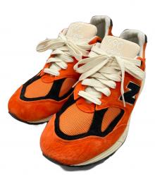 NEW BALANCE（ニューバランス）の古着「ローカットスニーカー」｜オレンジ