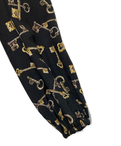 DOLCE & GABBANA（ドルチェ＆ガッバーナ）DOLCE & GABBANA (ドルチェ＆ガッバーナ) 総柄ボウタイブラウス ブラック サイズ:42の古着・服飾アイテム