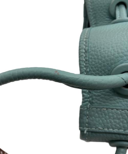 VASIC（ヴァジック）VASIC (ヴァジック) 巾着ハンドバッグ ブルーの古着・服飾アイテム