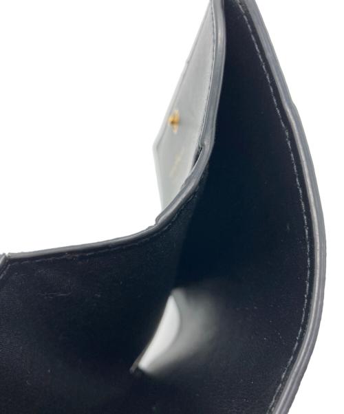 Salvatore Ferragamo（サルヴァトーレ フェラガモ）Salvatore Ferragamo (サルヴァトーレ フェラガモ) ガンチーニ コンパクトウォレット ブラックの古着・服飾アイテム