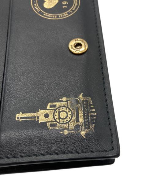 Salvatore Ferragamo（サルヴァトーレ フェラガモ）Salvatore Ferragamo (サルヴァトーレ フェラガモ) ガンチーニ コンパクトウォレット ブラックの古着・服飾アイテム