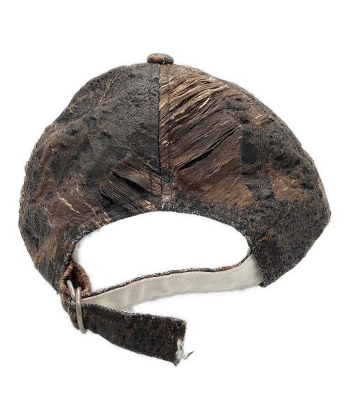 Acne studios（アクネ ストゥディオス）ACNE STUDIOS (アクネ ストゥディオス) ディストレストモノグラムキャップ ブラウンの古着・服飾アイテム