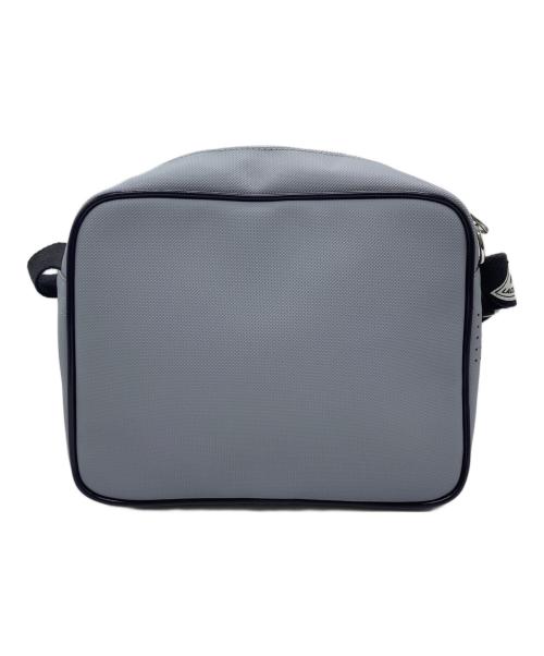 LACOSTE（ラコステ）LACOSTE (ラコステ) クラブ1930ショルダーバッグ スカイブルーの古着・服飾アイテム