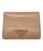 PRADAプラダ）の古着「コンパクトウォレット」｜ベージュ