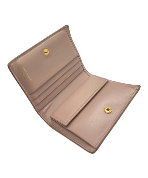 PRADA（プラダ）PRADA (プラダ) コンパクトウォレット ベージュの古着・服飾アイテム