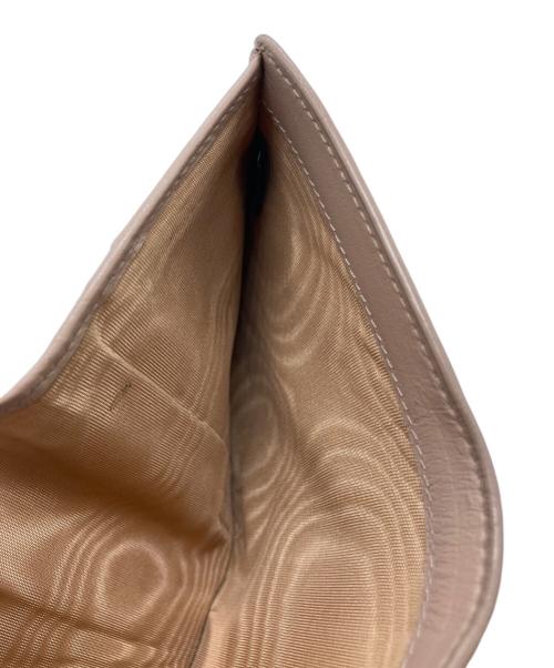 PRADA（プラダ）PRADA (プラダ) コンパクトウォレット ベージュの古着・服飾アイテム