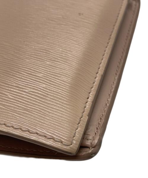 PRADA（プラダ）PRADA (プラダ) コンパクトウォレット ベージュの古着・服飾アイテム