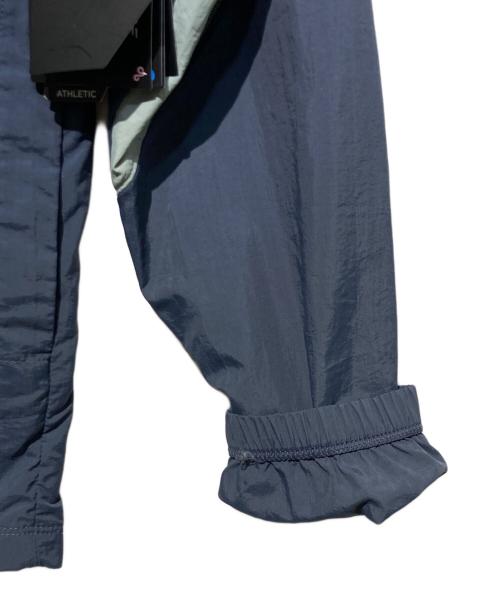 NEW BALANCE（ニューバランス）NEW BALANCE (ニューバランス) グラフィック ウーブン ジャケット グレー サイズ:XSの古着・服飾アイテム