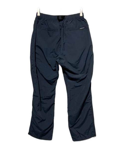 GRAMICCI（グラミチ）GRAMICCI (グラミチ) LOWERCASE (ロウワーケース) NYLON PACKABLE TRACK PANTS ネイビー サイズ:Mの古着・服飾アイテム