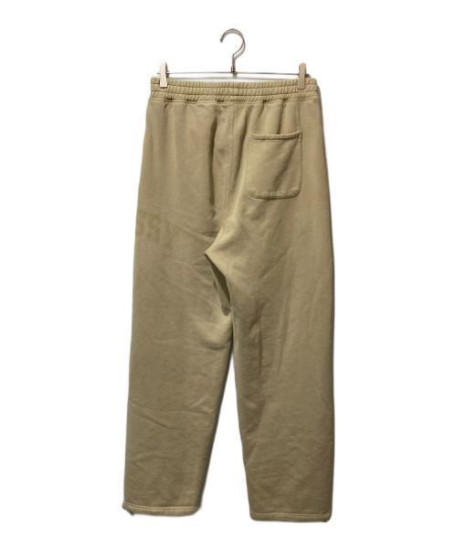 stussy（ステューシー）stussy (ステューシー) FADED GRAPHIC FLEECE PANT ベージュ サイズ:SIZE Sの古着・服飾アイテム