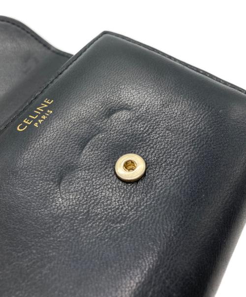 CELINE（セリーヌ）CELINE (セリーヌ) トリオンフ スモールフラップウォレット ブラックの古着・服飾アイテム