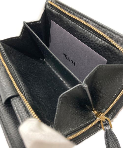 PRADA（プラダ）PRADA (プラダ) サフィアーノラウンドファスナーウォレット ブラックの古着・服飾アイテム