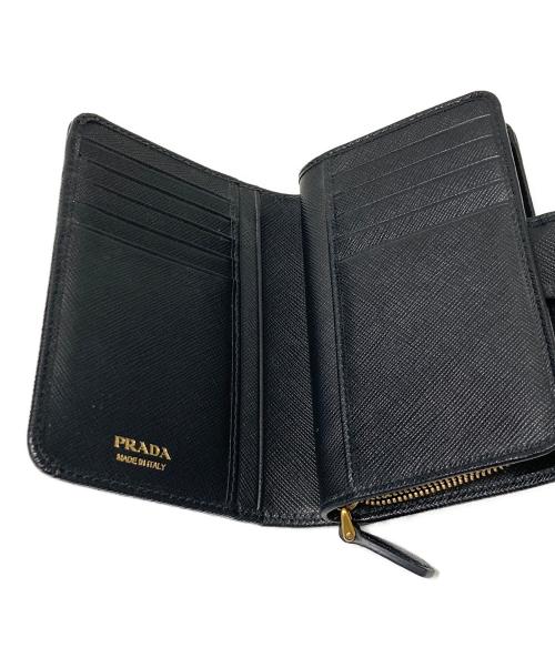 PRADA（プラダ）PRADA (プラダ) サフィアーノラウンドファスナーウォレット ブラックの古着・服飾アイテム
