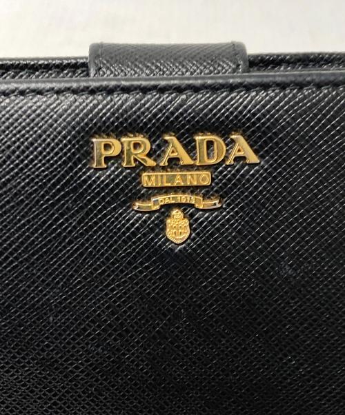 PRADA（プラダ）PRADA (プラダ) サフィアーノラウンドファスナーウォレット ブラックの古着・服飾アイテム