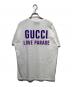 GUCCI（グッチ）の古着「LOVE PARADE バックプリントTシャツ」｜ホワイト