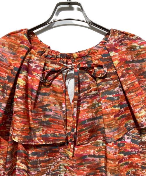 HERALBONY（ヘラルボニー）HERALBONY (ヘラルボニー) ラッフルワンピース「からくちカレー」 レッド サイズ:Fの古着・服飾アイテム