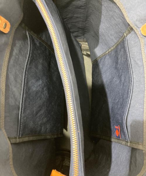 豊岡鞄（トヨオカカバン）豊岡鞄 (トヨオカカバン) TUTUMU News paper tote ネイビーの古着・服飾アイテム