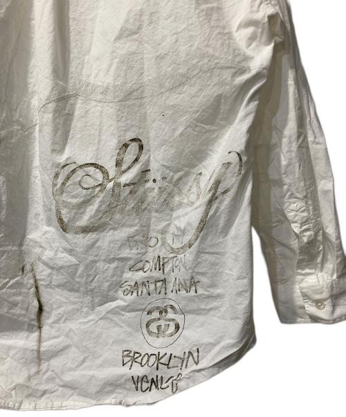 stussy（ステューシー）stussy (ステューシー) WORLD TOUR SHIRT ホワイト サイズ:Lの古着・服飾アイテム
