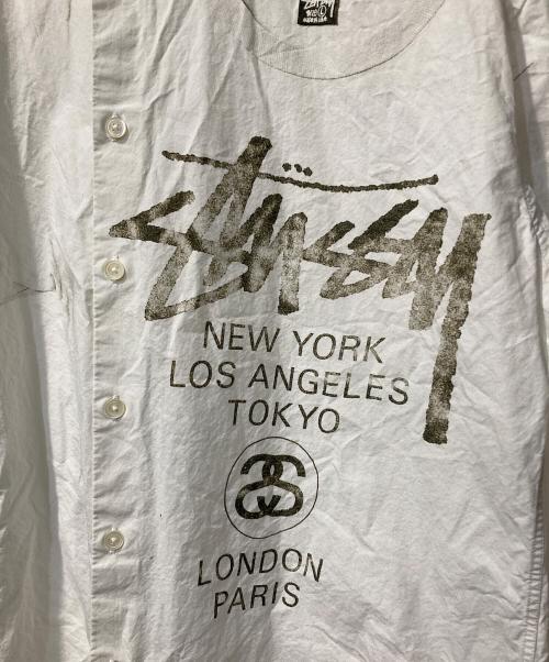 stussy（ステューシー）stussy (ステューシー) WORLD TOUR SHIRT ホワイト サイズ:Lの古着・服飾アイテム