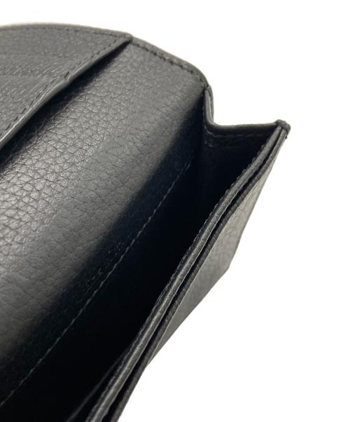 Saint Laurent Paris（サンローランパリ）Saint Laurent Paris (サンローランパリ) カサンドラ シャドウ ビジネスカードケース ブラックの古着・服飾アイテム