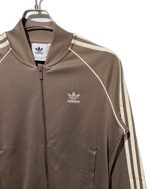 adidas（アディダス）adidas (アディダス) アディカラー クラシックス SSTトラックジャケット ブラウン サイズ:Sの古着・服飾アイテム