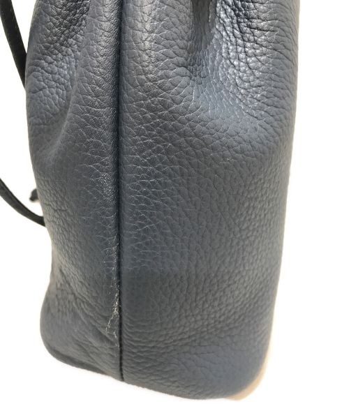 hinn（ヒン）hinn (ヒン) 巾着ポーチ スカイブルーの古着・服飾アイテム