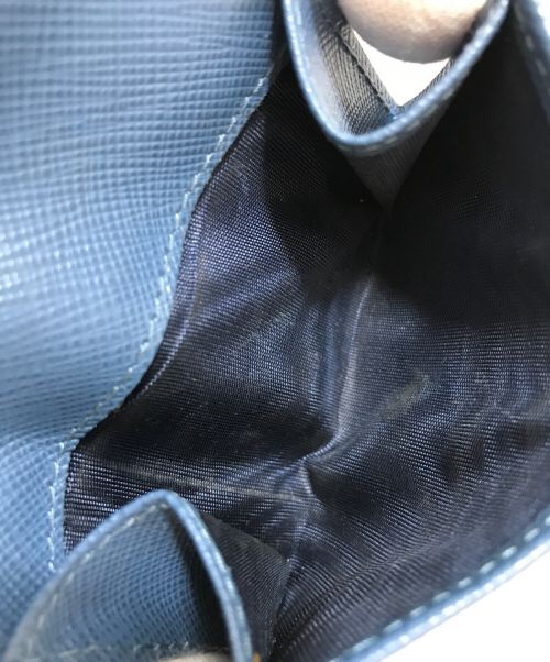 PRADA（プラダ）PRADA (プラダ) サフィアーノレザー3つ折り財布 スカイブルーの古着・服飾アイテム