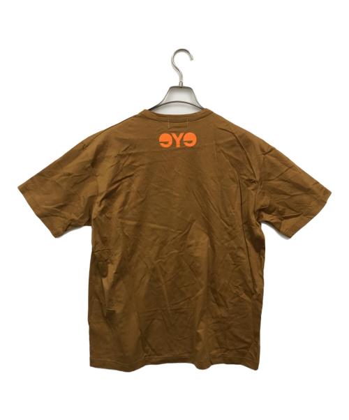 eYe COMME des GARCONS JUNYAWATANABE MAN（アイ コム デ ギャルソン ジュンヤ ワタナベ マン）eYe COMME des GARCONS JUNYAWATANABE MAN (アイ コム デ ギャルソン ジュンヤ ワタナベ マン) CarHartt (カーハート) コラボプリントTシャツ ブラウン サイズ:Lの古着・服飾アイテム